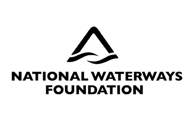 A pixelated black staircase with seven steps ascending from left to right, set against a white background.
